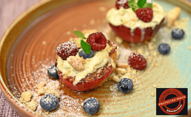Grilled peaches with mascarpone cream, blueberries and crumbled shortbread