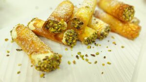 Tuile cigars with pistachio cream